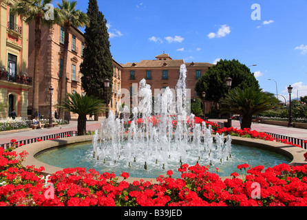 Fountain and flowers adjacent to Murcia Town Hall, Murcia, Spain Stock Photo