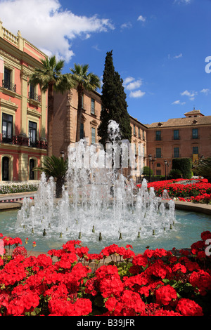 Fountain and flowers adjacent to Murcia Town Hall, Murcia, Spain Stock Photo