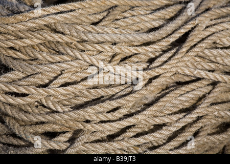 Rope coiled on the quayside in the harbour at Stonehaven, Aberdeenshire, Scotland Stock Photo