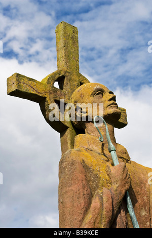 A statue of St Aidan erected in his honour on Lindisfarne (Holy Island) Northumberland, England Stock Photo
