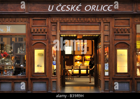The ornate wooden frontage of an upmarket jewelry and souvenir shop at Number 30 Celetna street Prague Stock Photo