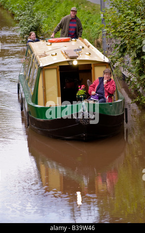 Canalboat about to enter the Ashford Tunnel on the Monmouthshire nad Brecon Canal near Crickhowell Powys Wales UK Stock Photo