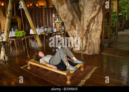 The dining room of the five star NGORONGORO CRATER LODGE has a SWING NGORONGORO CRATER TANZANIA MR Stock Photo