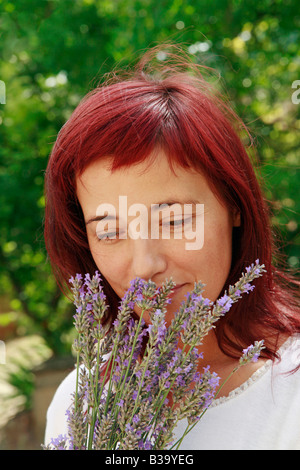 Smelling lavender Stock Photo