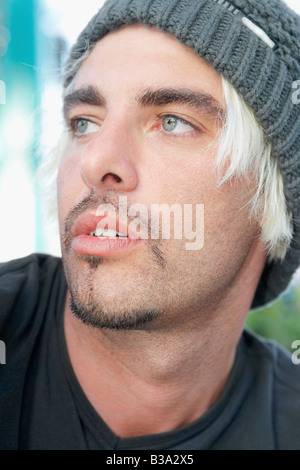 Hispanic man wearing wool hat Stock Photo