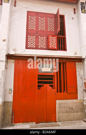 MACAU CHINA Red lacquer facades on Rua da Felicidade, the former red light district Stock Photo