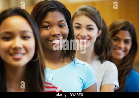 Multi-ethnic teenaged girls in row