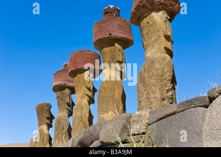 Chile, Rapa Nui, Easter Island, Anakena beach, monolithic giant stone Moai statues of Ahu Nau Nau Stock Photo