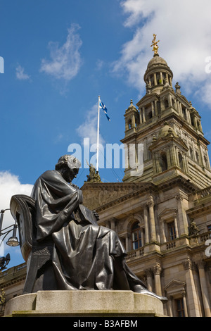 Statue of Doctor Thomas Graham 1805 1869 George Square Glasgow with city chambers in the background Stock Photo