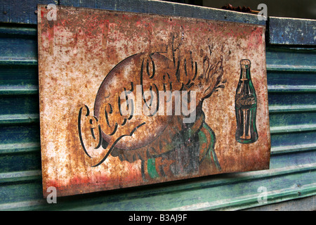 'Old decaying rusty coca cola Advertising sign' Stock Photo