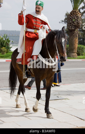 A royal guard stands at the entrance to the Mausoleum of Mohammed V in Rabat Stock Photo