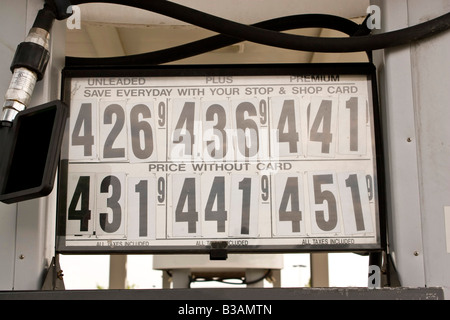 A gas station sign showing the ever rising fuel costs Stock Photo