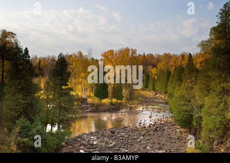 Fall's glory on display around the Gooseberry River in Gooseberry Falls State Park, Minnesota USA. Stock Photo