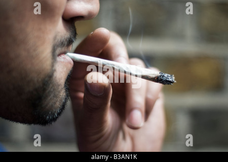 UK, England, London, Close up of man smoking cannabis Stock Photo