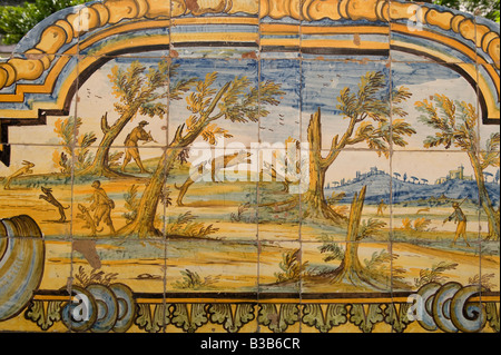 Tiled seat within the cloisters of Santa Chiara Stock Photo