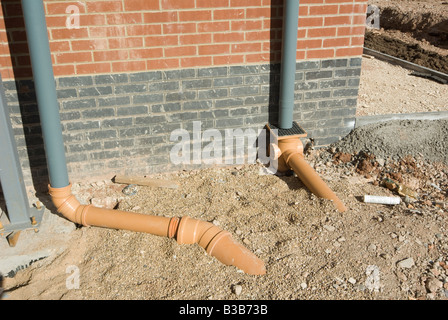 drainage pipework on a newly constructed building in the uk Stock Photo