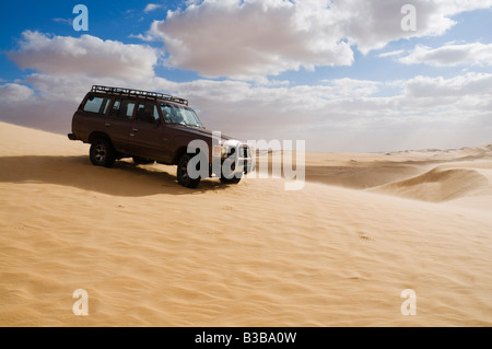 Jeep on Dune, Libyan Desert, Egypt Stock Photo