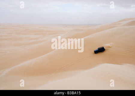 Jeep on Sand Dunes, Libyan Desert, Egypt Stock Photo