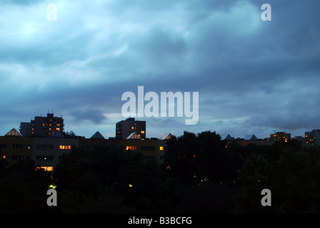 Heavy clouds over house of flats in Warsaw, Poland Stock Photo