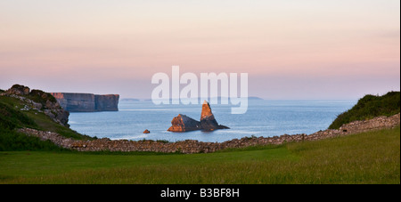 early morning at Church Rock, near Broad Haven South, Pembrokeshire. Caldy Island visible in the background. Stock Photo