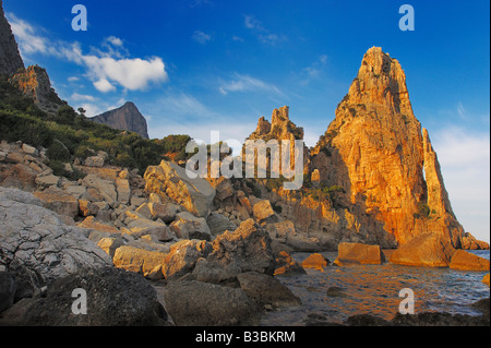 Rockformation Pedra Longa at last light Costa Smeralda Sardinia Italy Stock Photo