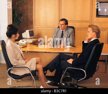 Business people discussing together in a meeting Stock Photo