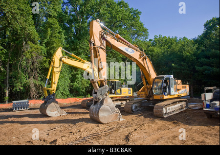 Two Front End Loaders Excavators At Construction Site, USA Stock Photo