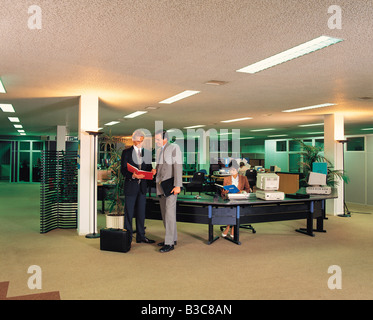 Businessmen discussing in office Stock Photo