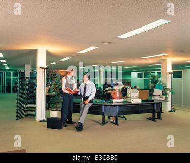 Businessmen discussing in office Stock Photo