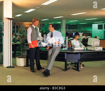 Businessmen discussing in office Stock Photo