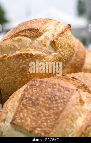 Loaves of bread for sale at a farmers market Stock Photo