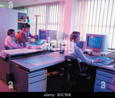 Businesspeople working in office Stock Photo