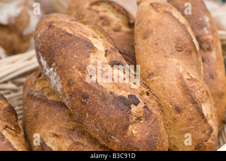 Individual loaves of bread for sale at a farmers market Stock Photo