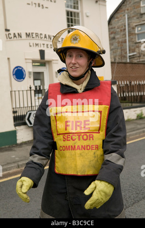 Fire brigade attending an incident at Cardigan west wales UK -  woman Fire Sector Commander in charge Stock Photo