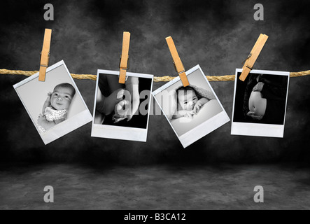 Polaroid Photos of an Newborn Infant and Pregnancy Shots Hanging on a Rope With Clothespins Stock Photo