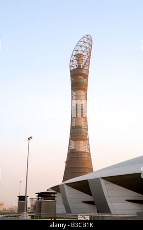 The Aspire sports academy in Doha Qatar with the 2006 Asian Games torch tower in the background Stock Photo