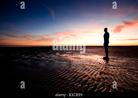 Anthony Gormley Iron Men Statues on Crosby Beach, Liverpool, UK Stock Photo