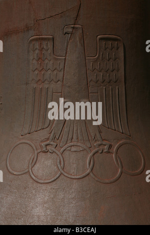 Nazi Eagle with Olympic rings depicted in the Olympic Bell from Olympia Stadium in Berlin, Germany Stock Photo