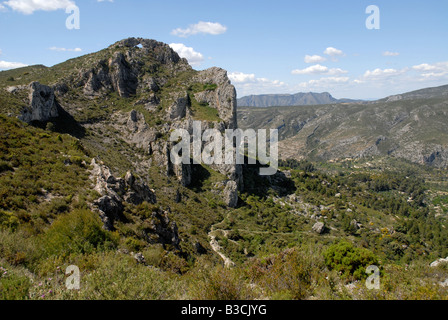 view to Penal Gros, Forada Rock Arch & Vall de Gallinera, Sierra de la Forada, Alicante Province, Comunidad Valenciana, Spain Stock Photo