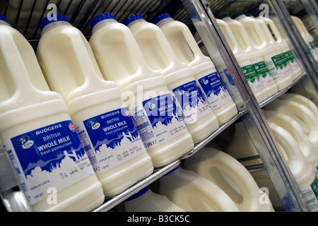 Containers of milk in a supermarket refrigerator in New York Stock Photo -  Alamy