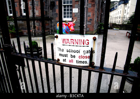 Security sign on school gates, Edinburgh Stock Photo