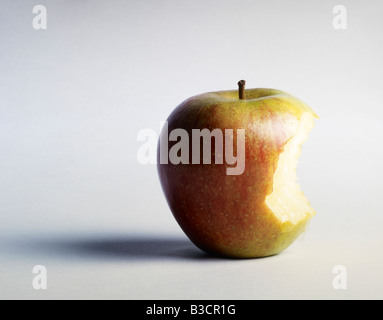 Apple with bite taken out Stock Photo - Alamy