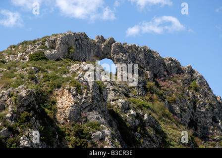 view to Penal Gros & Forada Rock Arch, Sierra de la Forada, Alicante Province, Comunidad Valenciana, Spain Stock Photo