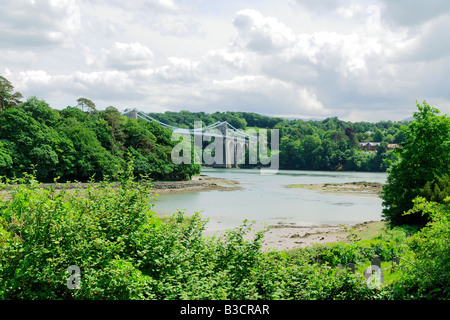 View from Church Island on Anglesey in North Wales looking across the Menai Strait to the Menai Bridge and the mainland Stock Photo