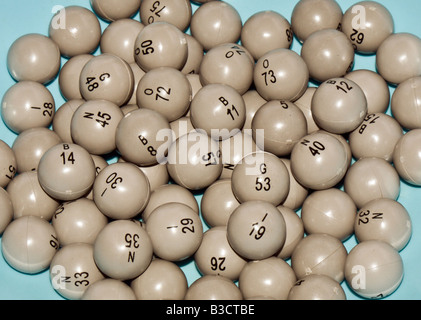 BINGO BALLS ARE DRAWN AT RANDOM FROM A ROTATING CAGE TO PREVENT THE BINGO CALLER FROM CHEATING Stock Photo