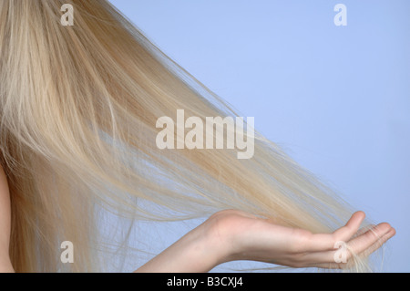 bad hair day style cut piled up onto hair clippers in shape of face