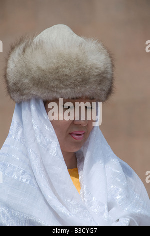 Kazakh woman wearing traditional fur headdress in Kazakhstan Stock Photo