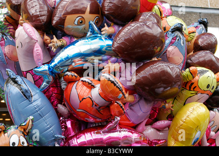 Helium filled novelty balloons Stock Photo