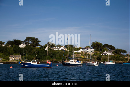 Yachts in the Carrick Roads estuary near Mylor Harbour on the River Fal in Cornwall south west England Stock Photo