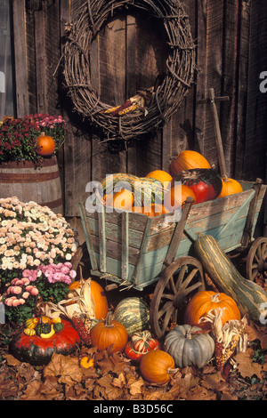 Vintage Wagon Filled with Gourds and Pumpkins Stock Photo